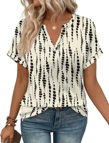 A scattered black spot print on an easy summer blouse, cut with a relaxed V-neck and rolled cuffs.