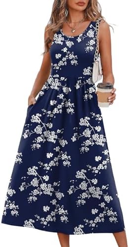A deep navy background grounds this sleeveless midi dress, covered in crisp floral blooms that stay bright through warm summer days.