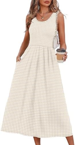 A sleeveless scoop-neck midi sundress cut in a breezy A-line drape with a high empire waist for warm weather packing.