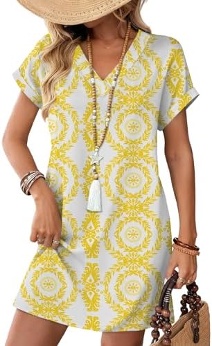 A sunny yellow ethnic print covers this easy t-shirt dress, cut with a gentle v-neck and deep side pockets for summer days.