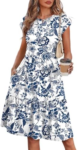 Cap sleeves and a tiered skirt give this vintage blue floral sundress an easy knee-length swing with side pockets.