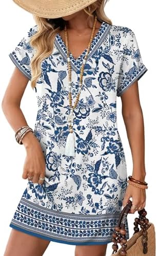 Crisp geometric motifs in cool blue and white define this relaxed tshirt dress with rolled short cuffs and hidden side pockets.