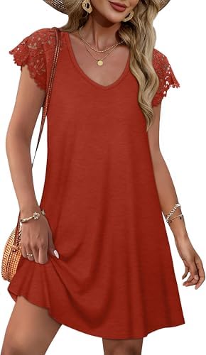 A vivid orange cotton-blend mini cut with delicate lace detailing across the short sleeves and an easy straight body.