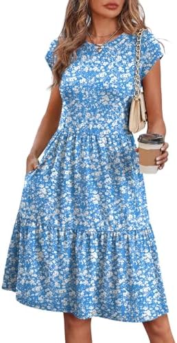 Crisp blue and white patterning defines this tiered sundress, cut with cap sleeves, practical side pockets, and an easy knee-length swing.