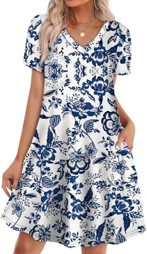 An airy swing dress patterned in an intricate ethnic blue floral print, finished with handy side pockets and a cool V-neck.