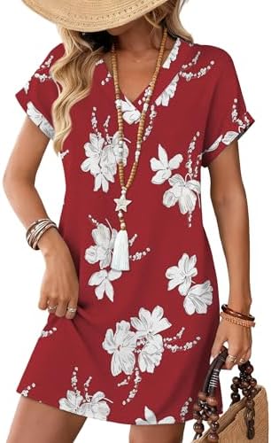 Bright red lily blossoms cover this easy jersey mini dress, cut with cuffed short sleeves and deep side pockets for summer days.