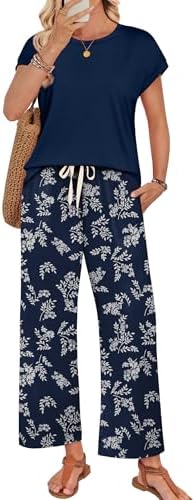 A matching navy blue two-piece set pairing a round-neck cap sleeve top with loose, flowy wide-leg lounge pants.