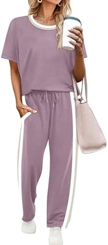A rich purple two-piece set made from drapey spacer knit with wide-leg cropped pants and an easy short sleeve top.