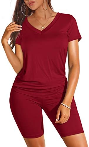 A deep wine red matching set pairing a relaxed v-neck tee with fitted high-waist shorts for sunny workouts and quick weekend runs.