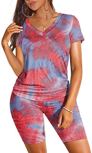 Soft purple tie dye covers this two-piece set, pairing a relaxed V-neck tee with supportive high-waist biker shorts.