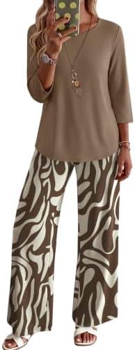 Graphic brown and white zebra stripes energize this two-piece set, cut with three-quarter sleeves and deep pant pockets.