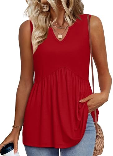 A vivid bright red sleeveless tunic with a graceful V-neckline and a flowy empire cut that floats away from the body.