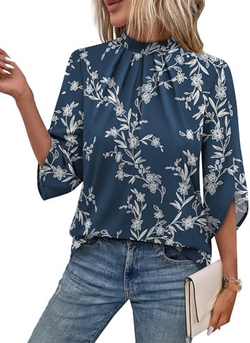 A deep navy backdrop scattered with delicate blooms gives this mock-neck blouse a calm, polished feel for desk and dinner.