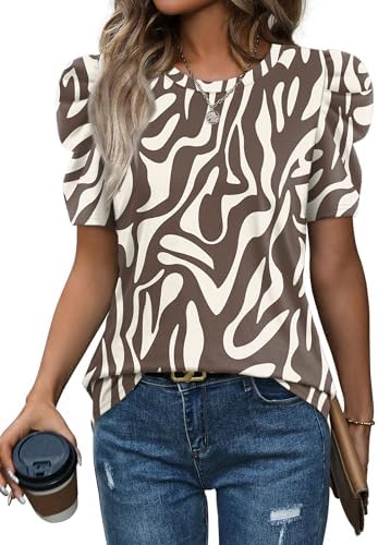 Bold zebra stripes bring graphic energy to this soft summer blouse with structured puff sleeves that hold their shape.