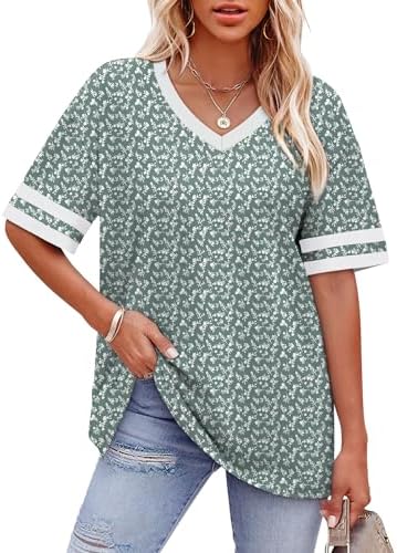 Crisp green fabric meets striped white cuffs on a relaxed knit tee that pairs easily with denim or leggings.