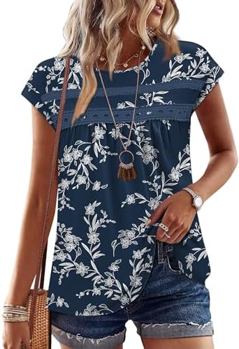 A deep navy backdrop sets off this delicate botanical print, finished with crochet lace trim and an airy peplum hem.