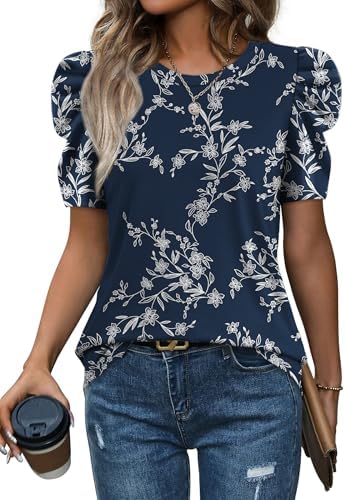 A deep floral navy print gives this puff sleeve knit top a richer look that pairs neatly with white denim or tailored trousers.