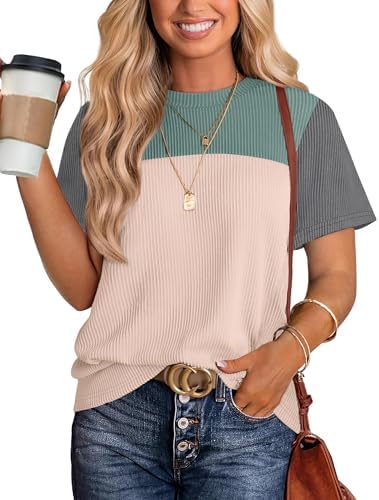 A vivid green shade anchors this soft striped knit top, cut with short sleeves and an easy loose tunic fit for warm days.