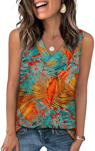 Lush green palm fronds spread across a cool knit tank cut with a clean V-neck and a relaxed straight hem.