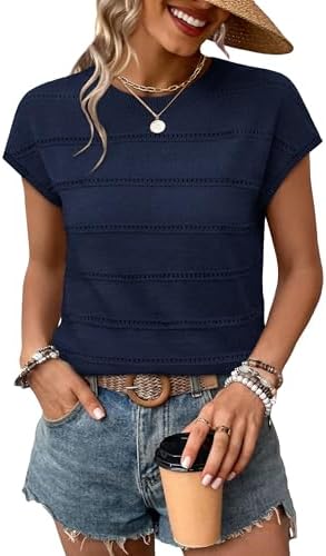 A deep navy blue knit featuring openwork eyelet stripes, cut with neat cap sleeves and a gentle scoop neckline.
