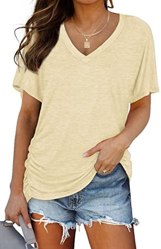 Gathered side shirring shapes this airy beige dolman tee, cut with a relaxed V-neck for warm beach days and casual travel.