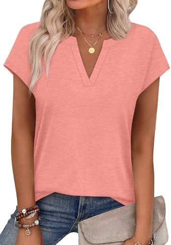 Sunlit coral knit with a notched v-neckline and breezy cap sleeves brightens up travel bags and denim shorts.