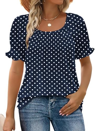 Crisp navy ground with scattered white polka dots sets off the square ruched neckline on this airy summer blouse.