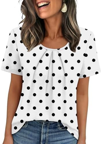 Tiny polka dots scatter across this breezy scoop-neck top, finished with soft front pleats for an easy summer drape.
