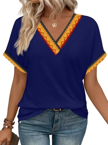 A deep navy knit with rolled sleeves and a neat V-neckline gives this loose summer top a clean, everyday finish.