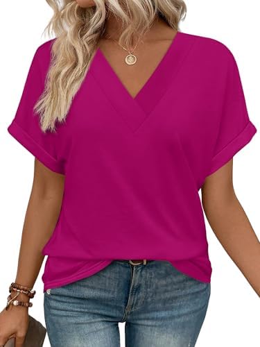 A vivid hot pink knit cut loose through the body with neat rolled sleeves and a classic V-neck.
