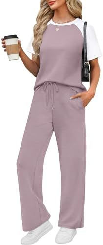 Cool grey balances soft purple panels across this breathable two-piece set, cut loose for long flights and sunny resort mornings.