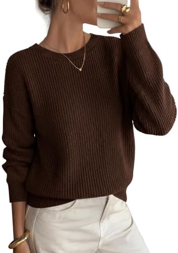A chunky ribbed knit sweater in deep coffee brown, cut with dropped shoulders for relaxed layering on crisp fall days.