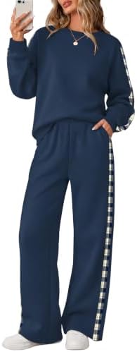 Brushed fleece paired with crisp navy-plaid side detailing makes this two-piece set a cozy pick for early morning flights and easy days.
