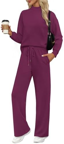 Spun from drapey spacer knit in deep dark purple, this two-piece set pairs a mock neck top with wide-leg pants for easy travel days.