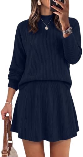 A mock neck sweater and high-waisted A-line skirt in deep navy blue, knitted from a lightweight stretch fabric for easy layering.