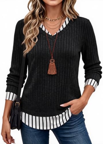 Striped black vertical panels give this lightweight pullover a layered look without the bulk of two separate pieces.