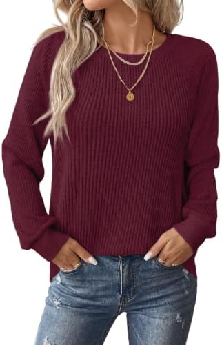 Ribbed vertical texture meets a rich red knit and raglan shoulders for an easy layer that pulls on fast over blue denim.