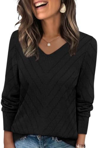 A crochet openwork knit brings airy texture to this long sleeve V-neck top, rendered in classic saturated black.