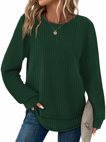 A soft waffle knit tunic in rich green with a curved hem that sits easily over your favorite denim or leggings.
