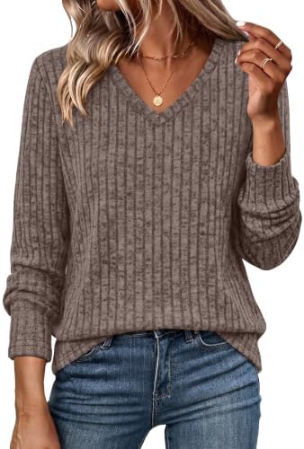 A deep brown ribbed knit tunic cut with a relaxed V-neckline and extra length through the hem for easy pairing over leggings.
