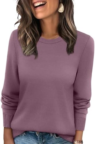 A muted grey purple sweater in a soft ribbed knit, cut loose through the body with a classic crewneck for cooler days.
