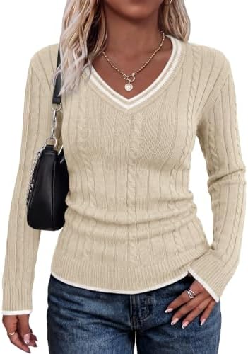 A soft apricot cable knit top edged in clean white tipping brings subtle warmth to cool mornings and breezy nights.