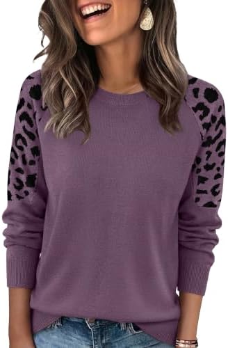 Muted grey purple meets knit leopard jacquard across the raglan sleeves on this soft pullover designed for early autumn days.