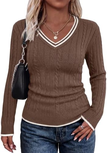 Deep coffee brown cable knit meets clean white tipping at the neck, cuffs, and hem in a trim pullover silhouette.