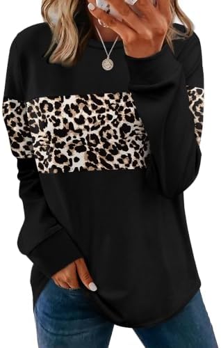 A curved tunic hem and brown leopard print bring plenty of visual interest to this soft crewneck long-sleeve knit top.