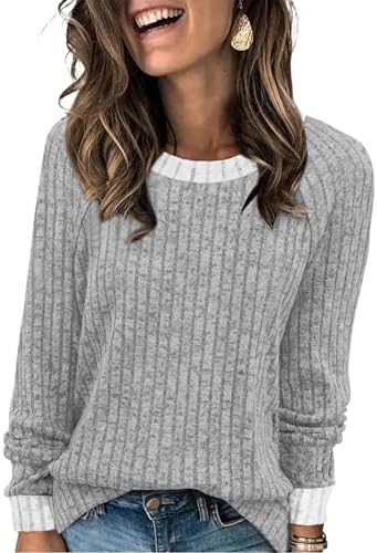 Knitted in a soft heathered grey, this lightweight boat neck tunic brings blanket-level softness to cool mornings and breezy nights.