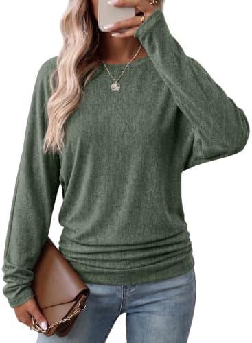 Gathered side ruching and generous dolman sleeves give this rich green pullover tunic a relaxed, easy shape that stays in place.