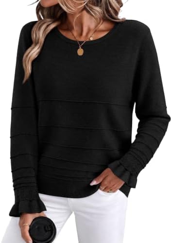 Ruffled cuffs and horizontal texture give this lightweight black pullover a neat, finished look for cooler days.