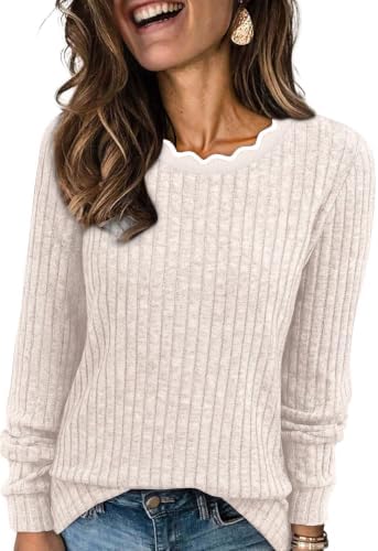 Scalloped edges soften the neckline of this light apricot knit, cut loose through the body for cool autumn mornings.