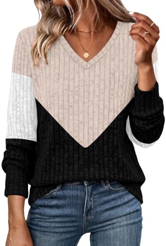 A ribbed split-tone knit pairs muted khaki with clean black across an easy tunic length cut for casual layering.
